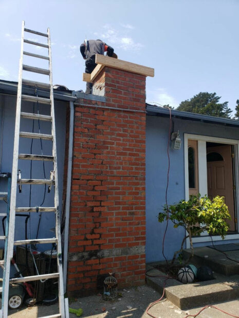 A Chimney Sweep performing some routine Chimney Cleaning in San Fransisco